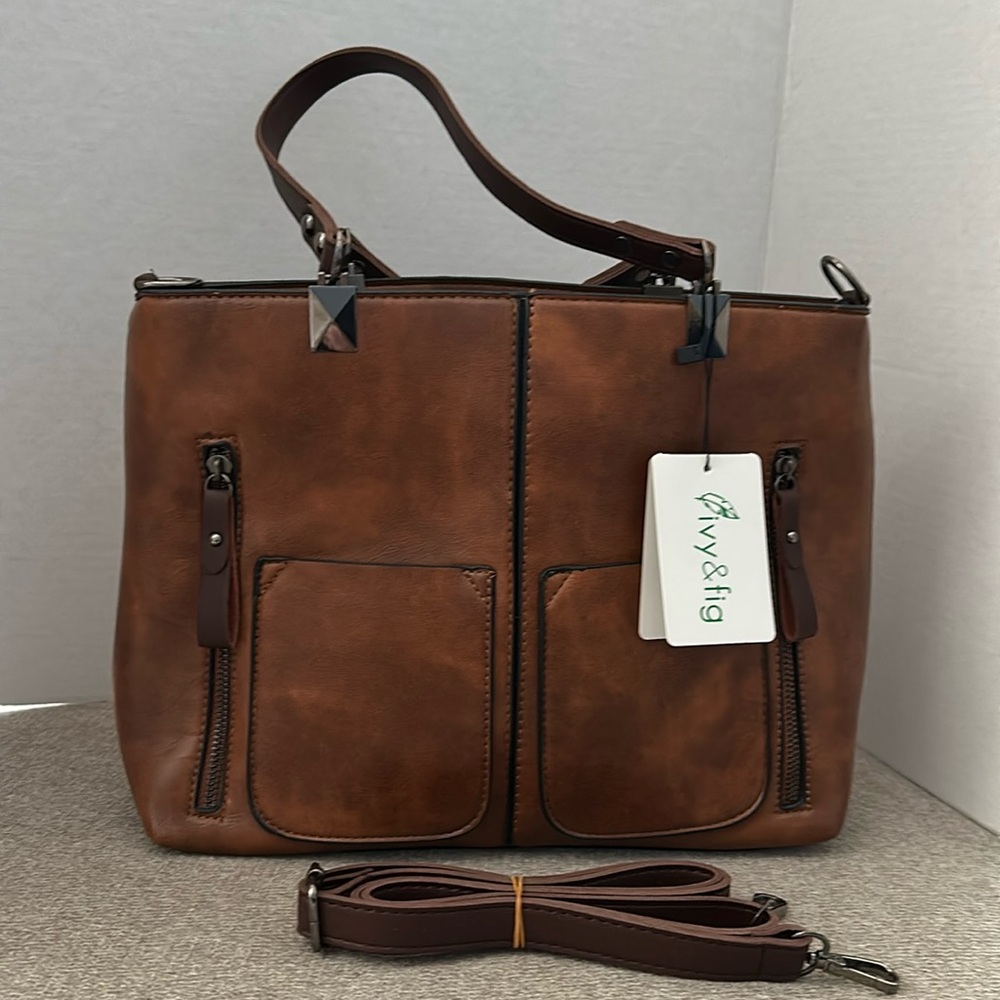 New. Ivy & Fig handbag. Brown. Lots of pockets. extra shoulder strap.